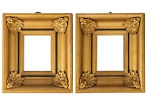 A pair of Victorian gilt gesso rectangular frames.