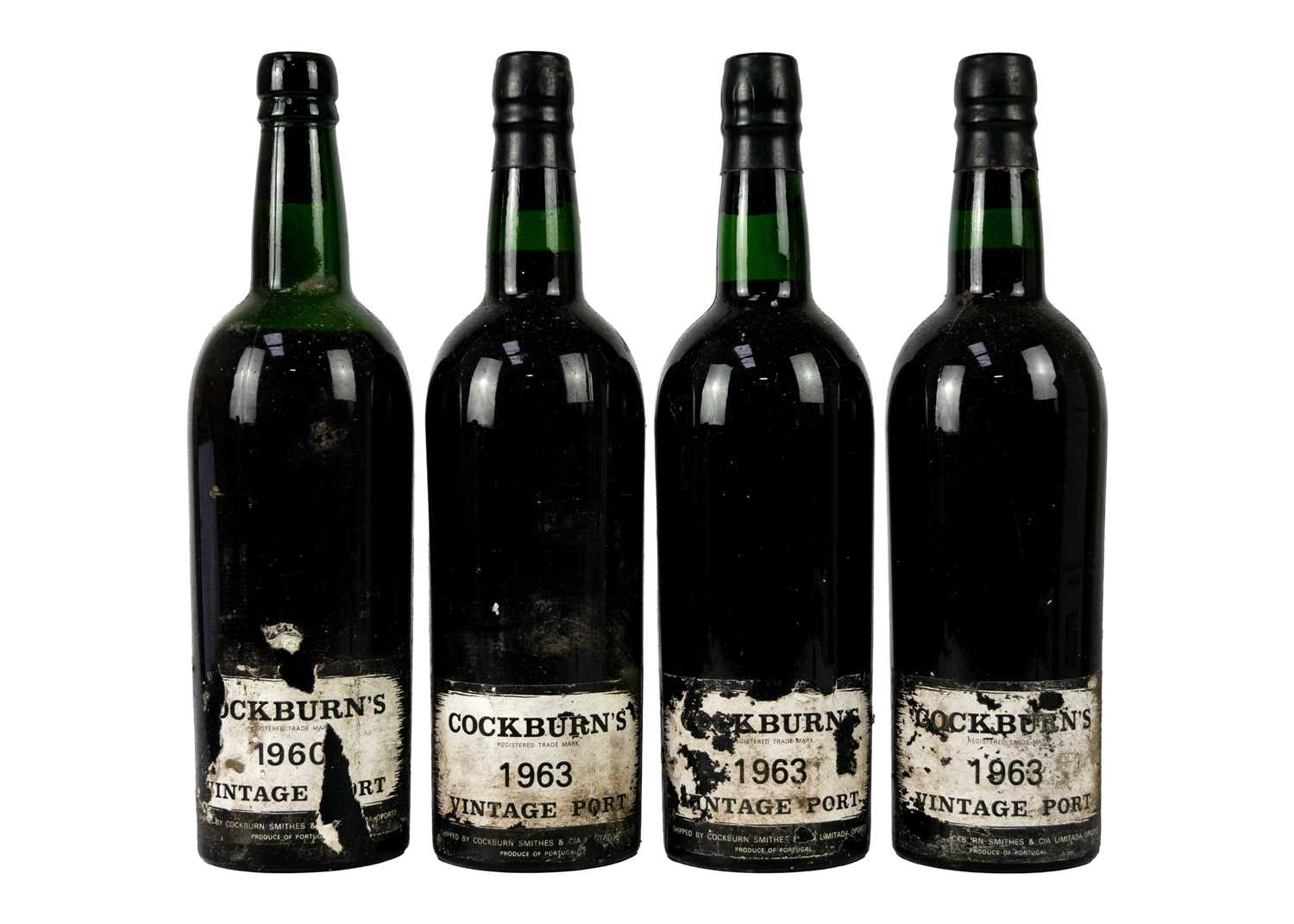 Three bottles of Cockburn's Port 1963.