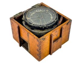 A WWII oak cased Air Force compass.
