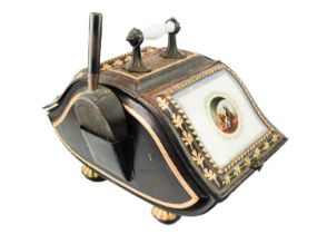 A Victorian toleware double coal scuttle.