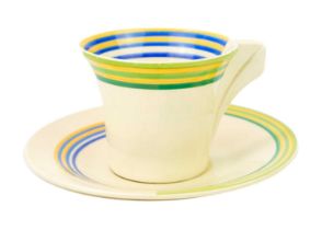 A Clarice Cliff Banded pattern daffodil shape cup and saucer.
