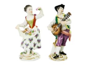 A Meissen porcelain figure of a lute player.