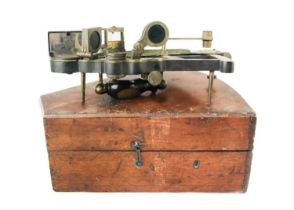 An ebony and brass octant.