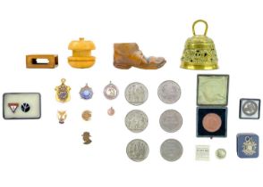 A collection of badges and medallions, etc.