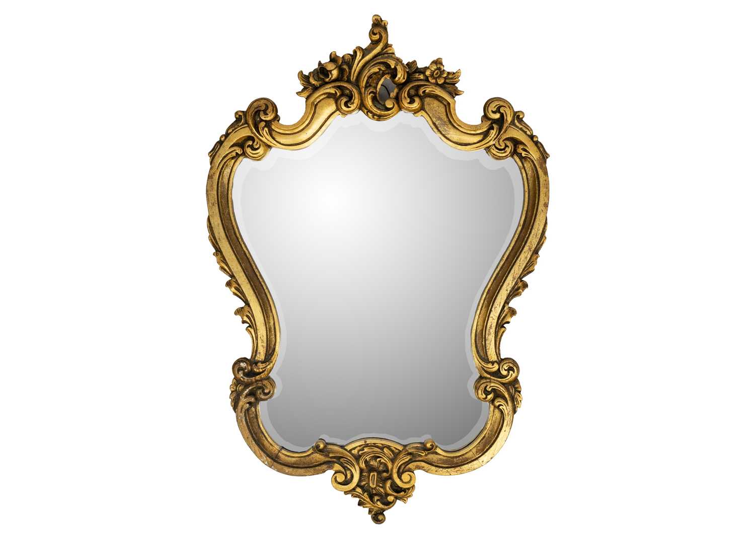 A gilded carved oak wall mirror.