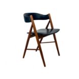 A mid century Danish teak elbow chair.