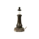 A Cornish serpentine turned lighthouse table lamp.