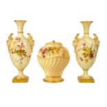 A pair of Royal Worcester blush ivory vases.