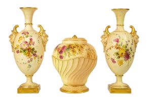 A pair of Royal Worcester blush ivory vases.
