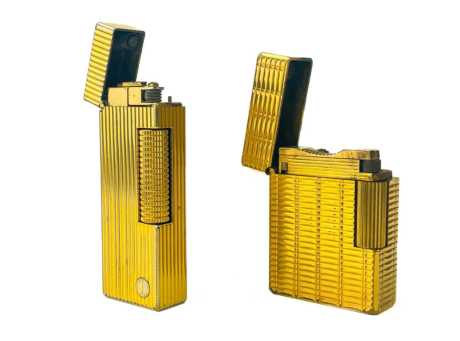 A Dunhill gold plated pocket lighter.