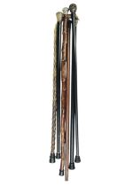 A Victorian ebonised walking cane.