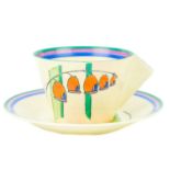 A Clarice Cliff Solomons Seal pattern conical cup and saucer.