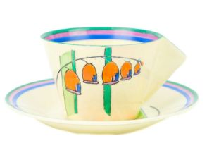 A Clarice Cliff Solomons Seal pattern conical cup and saucer.