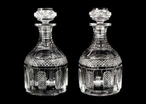 A pair of Georgian design cut glass decanters and stoppers.