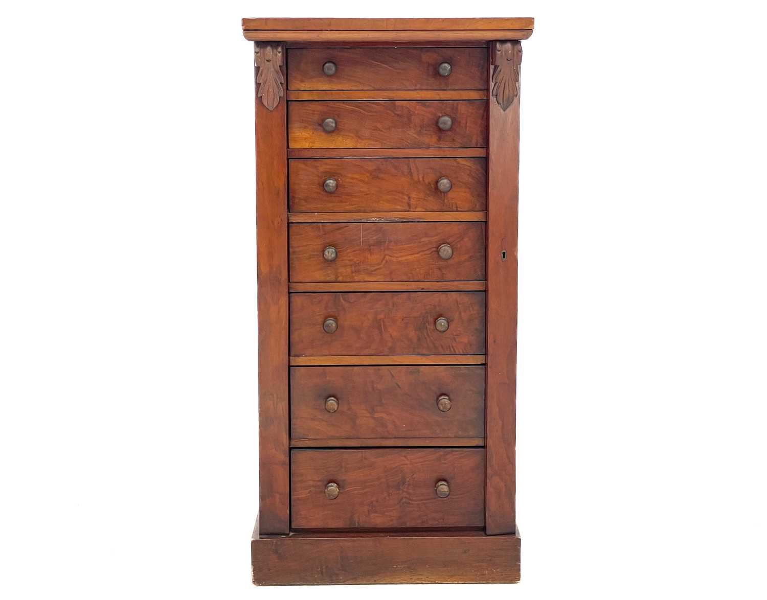 A Victorian mahogany Wellington chest.