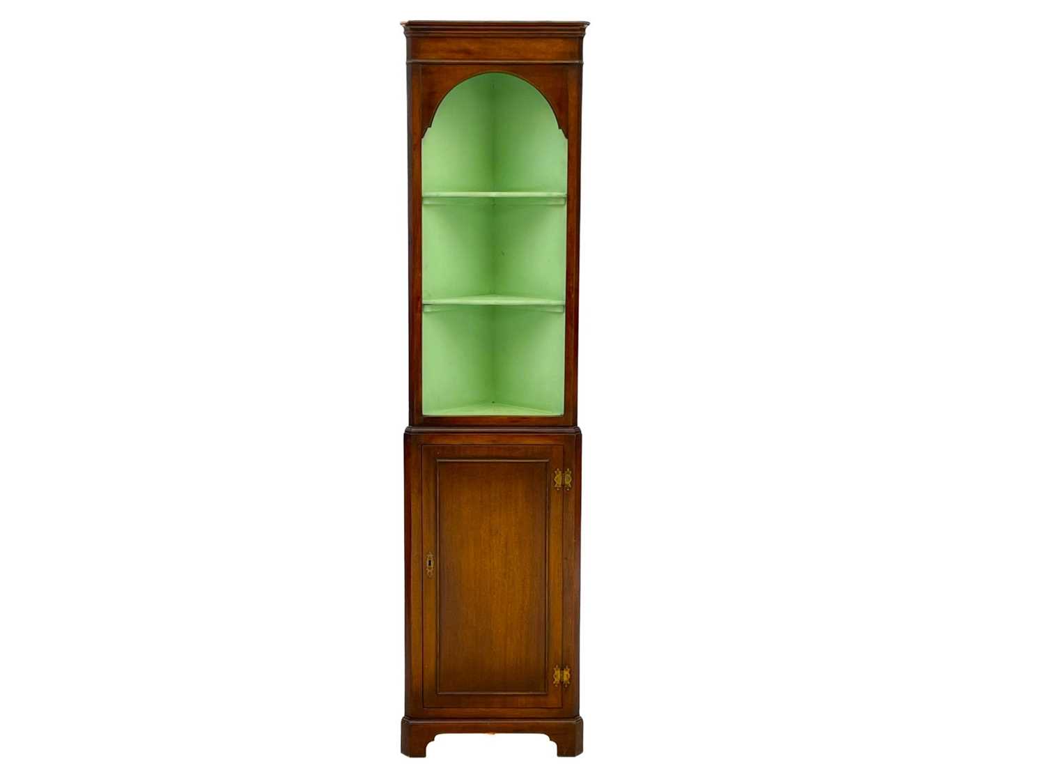 A mahogany corner display cabinet, of diminutive proportions.