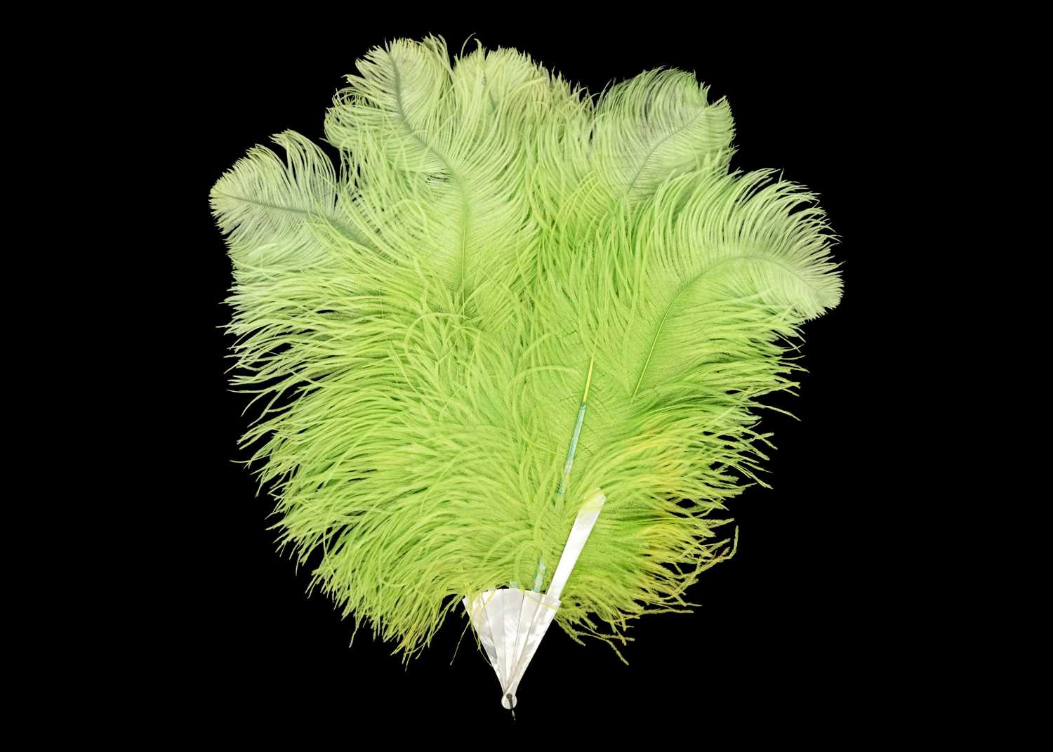 A lime green ostrich feather fan with mother-of-pearl guard sticks. - Image 2 of 5