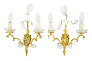 A pair of gilt metal twin branch wall lights.