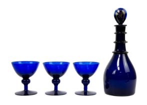 A 19th century Bristol Blue glass rum decanter.