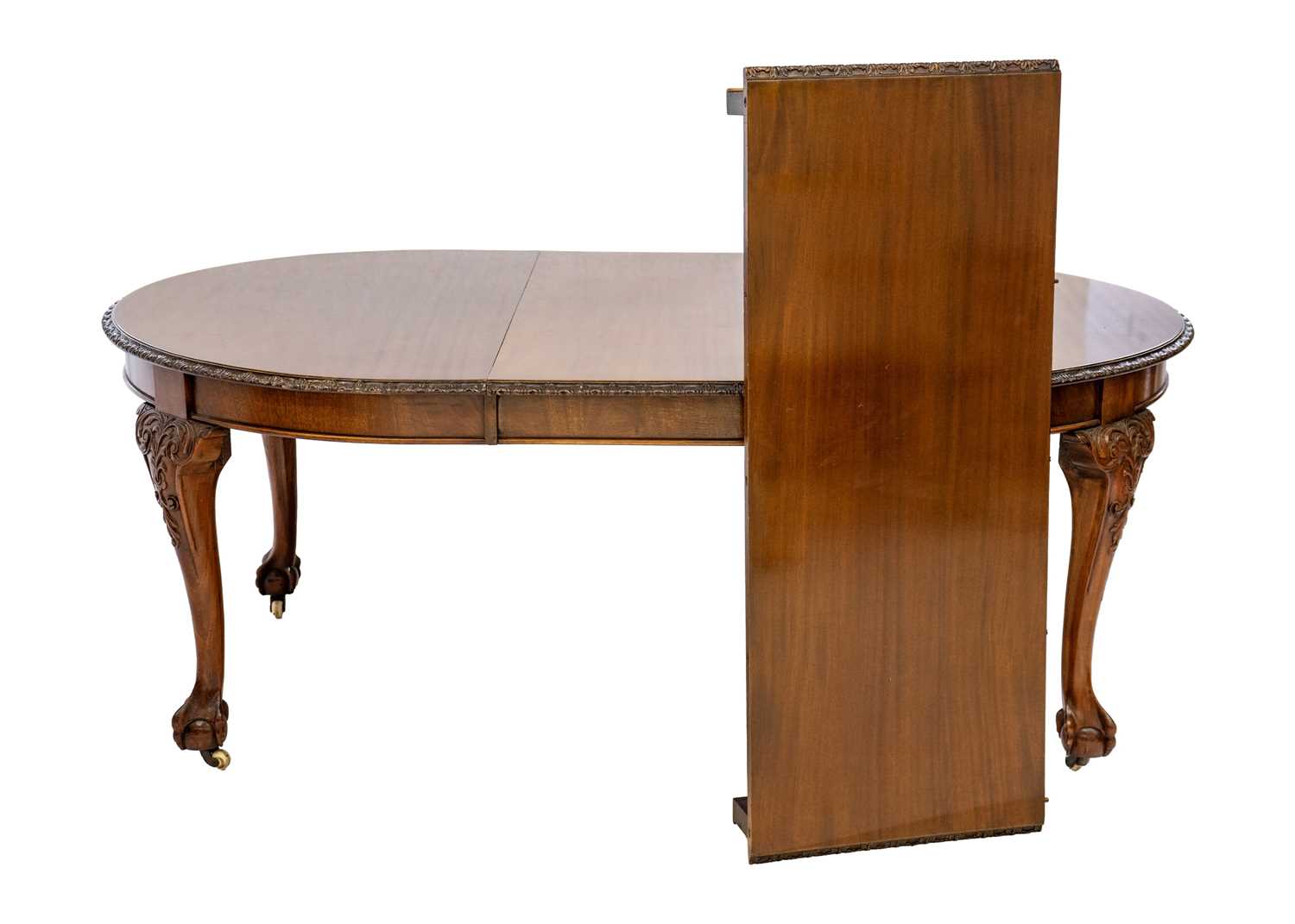 A Victorian mahogany extending dining table. - Image 2 of 7