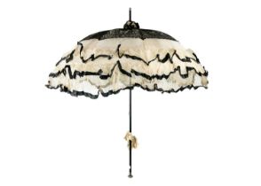 A Victorian silk and lace parasol.