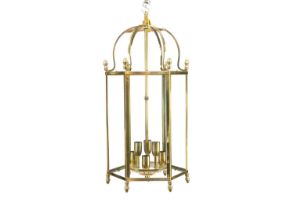 A glazed brass hexagonal hall lantern.