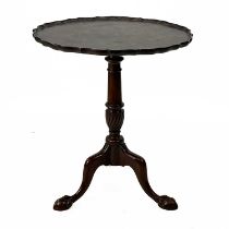 A George III style burr elm pie crust tripod wine table.