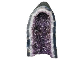 A large free standing 'cathedral' amethyst geode.