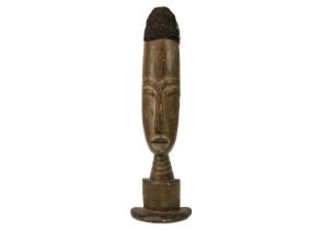 An African wood carved tall bust.