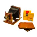 A Thornton Pickard Triple Victo mahogany folding plate camera.