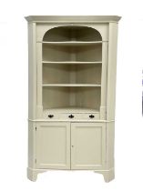 A late Victorian painted pine corner cupboard.