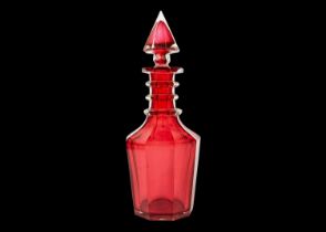 A 19th century ruby glass decanter.