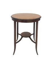 An Edwardian mahogany satinwood crossbanded and boxwood strung inlaid circular occasional table.