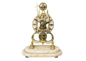 An English brass cathedral skeleton clock.
