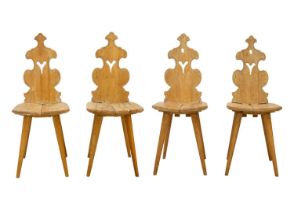 A set of four ash Swiss hall chairs.