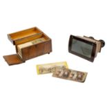 A Victorian walnut cased Brewster type stereoscopic viewer.