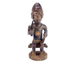 A good wood carved figure possibly Zaire Bembe.