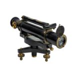 A surveyor's black lacquered brass theodolite.