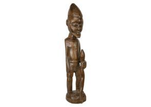 A large African wood carved standing figure.