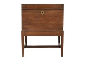 A George III mahogany cellarette on stand.