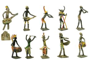 A group of ten African cast metal musicians and dancers.