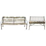 A cast metal and slatted wood garden bench, and a wrought metal and slatted wood bench.