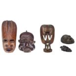 An African carved wood carved mask.