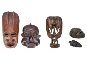 An African carved wood carved mask.