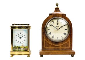 A Diamond Boutique brass cased carriage clock.