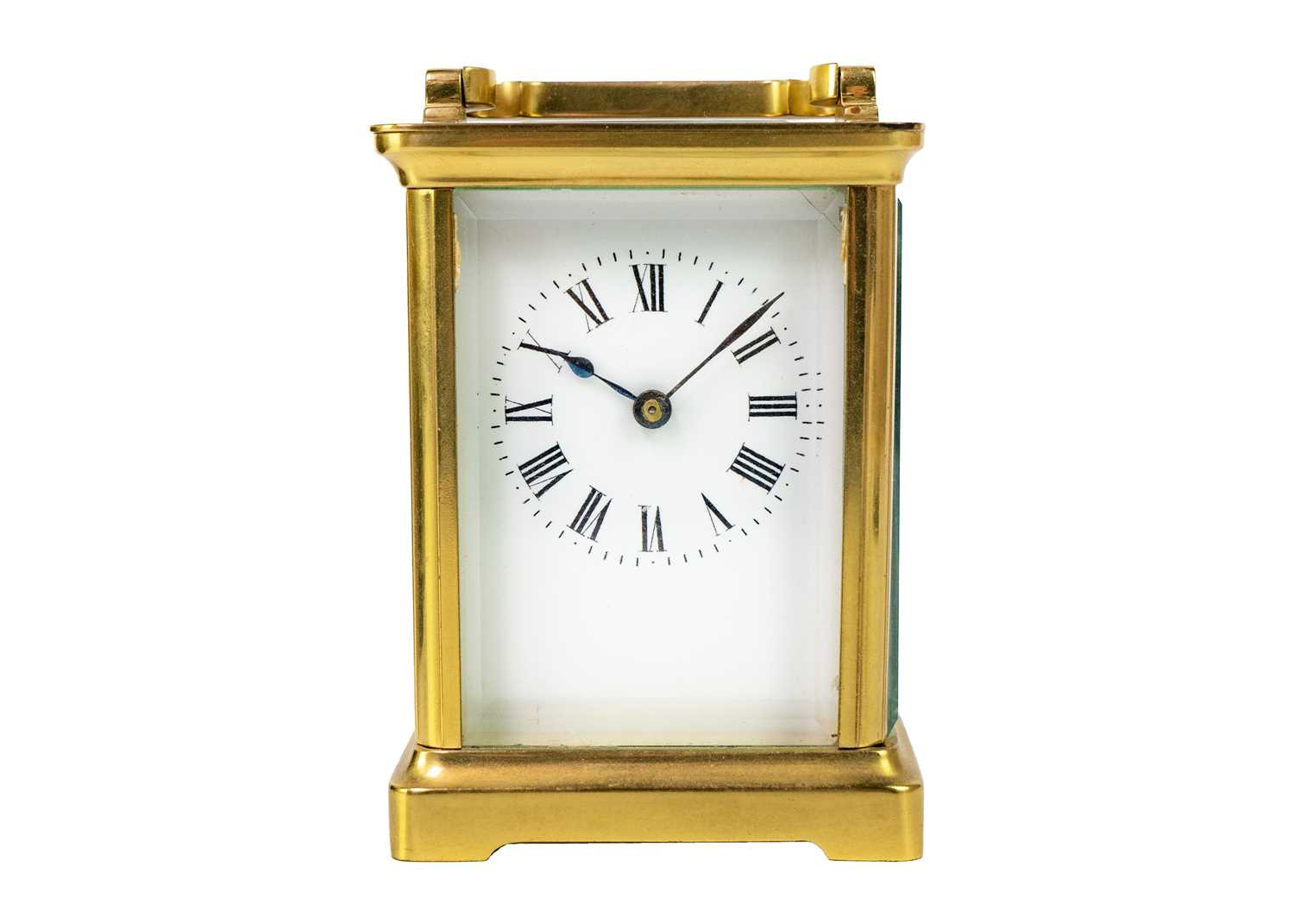 A French brass cased carriage timepiece.