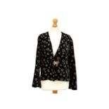 An early-mid 20th century black velvet ladies jacket.