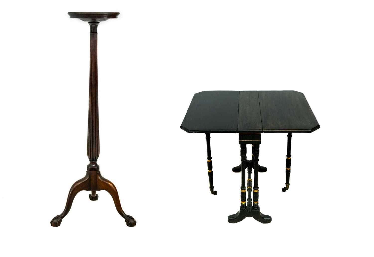 A diminutive ebonised and gilt Victorian Sutherland table.