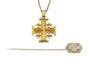 A 10ct white gold diamond set stick pin and a 14ct Jerusalem Cross pendant on 9ct chain.