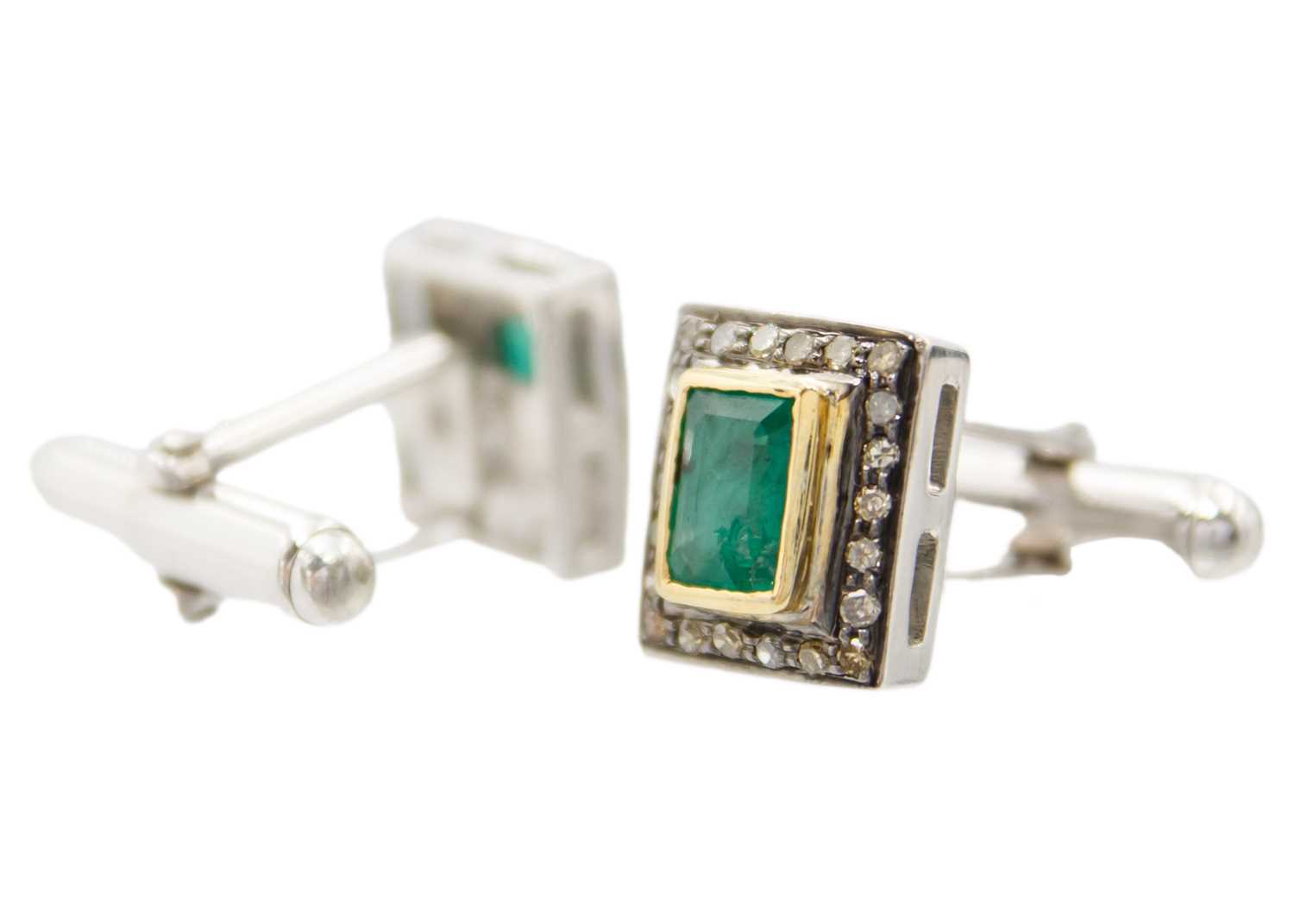 A pair of silver and silver gilt emerald and diamond set cufflinks. - Image 2 of 2